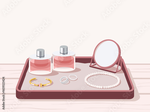 Elegant vanity tray with perfume, mirror, and jewelry on a wooden table