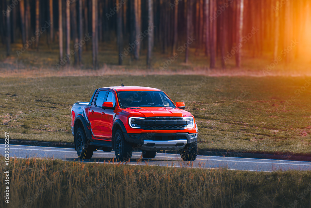 Fototapeta premium Four-wheel drive truck in open nature