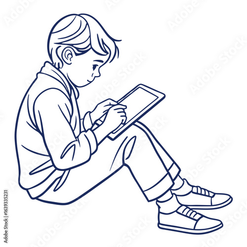 Young boy sitting on the floor using a digital tablet with a stylus pen