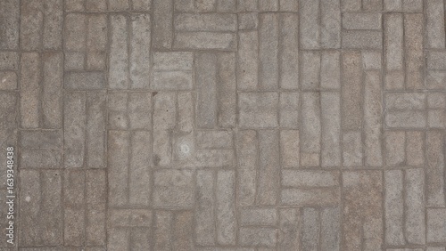 Floor surface textured with square cement bricks