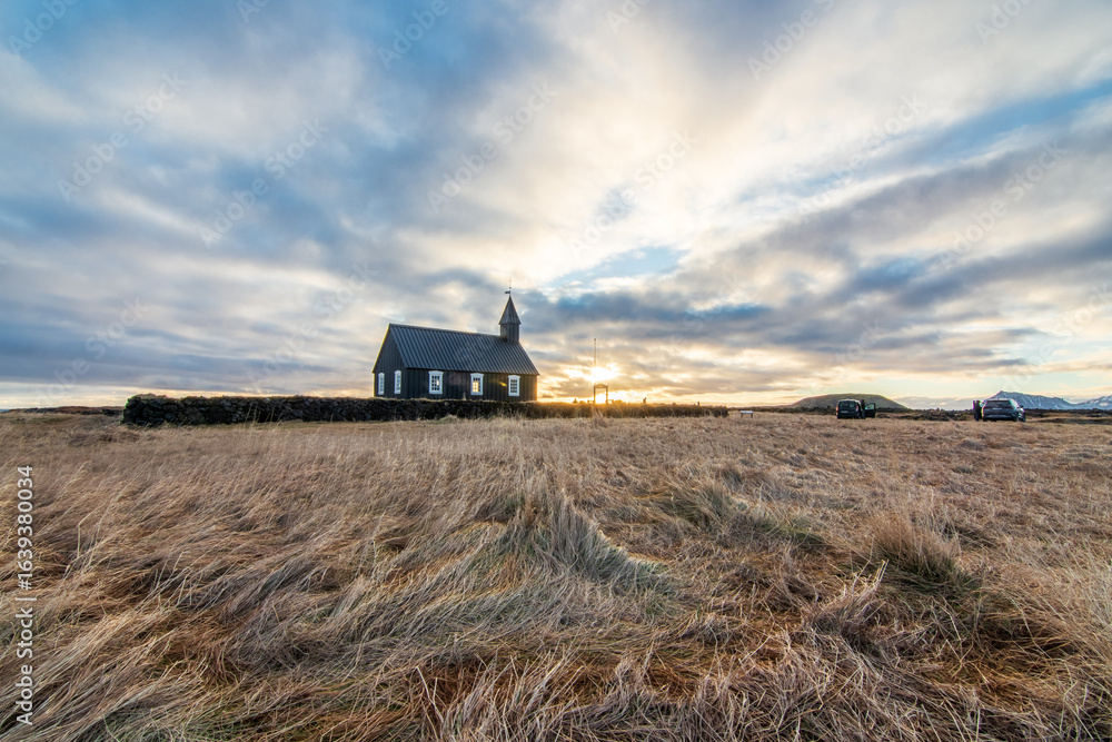 Naklejka premium Búðir Black Church after Storm at Sunset