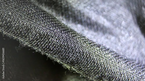 Black cotton textile material cloth texture blur background macro