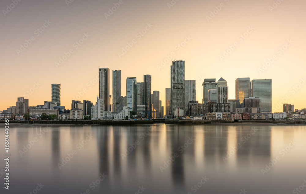 Fototapeta premium Canary Wharf at sunset and slack tide, giving a lovely reflection on the water