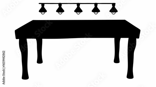 Silhouette of a table with curved legs under a row of five pendant lights hanging from a straight bar above