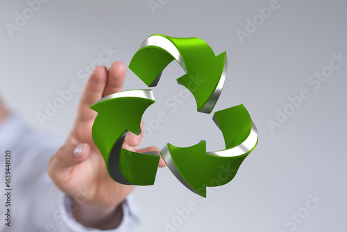 Green 3D recycling symbol i...