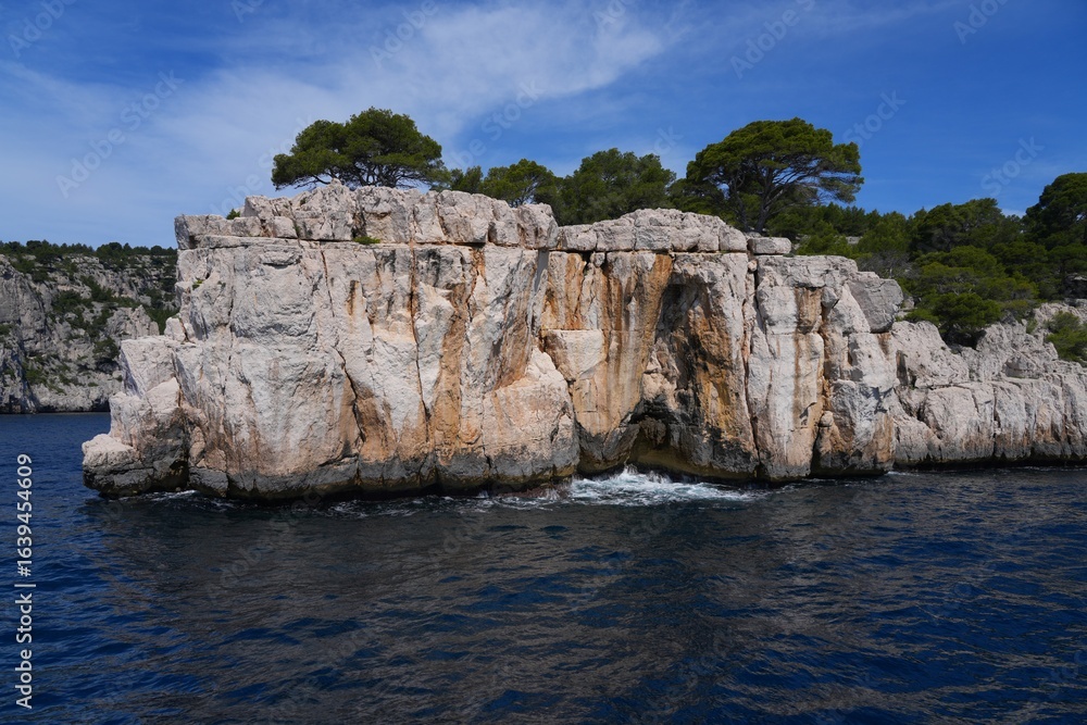 Fototapeta premium View of the Calanques de Cassis, a national park of limestone cliffs over the Mediterranean Sea near Marseilles, France