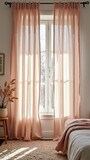 Sunlit bedroom window with sheer pink curtains and cozy decor