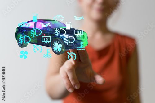 Woman interacts with a digi...