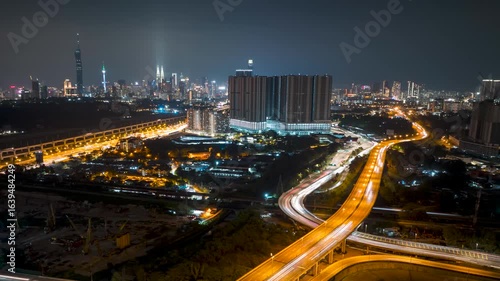 4k aerial time lapse of night scene at Kuala Lumpur city center. Tilt up