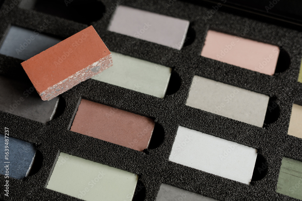 Fototapeta premium High-quality image of various color swatches in a foam tray, perfect for design and architecture projects.