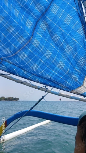 Boat Sailing Through Gentle Ocean Breeze