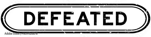 Grunge black defeated word rubber seal stamp on white background