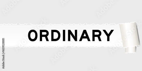 Ripped gray paper background that have word ordinary under torn part