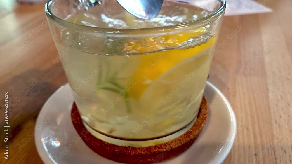 Refreshing Lemon Drink on Wooden Table - Perfect for Summer Refreshment Concept Refreshing Lemon Drink on Wooden Table - Perfect for Summer Refreshment Concept