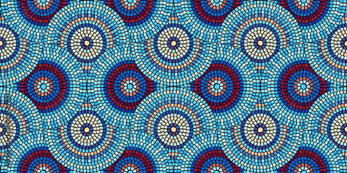 Blue abstract mosaic seamless pattern. Fragments of a circle laid out from tiles trencadis. Vector tile background.