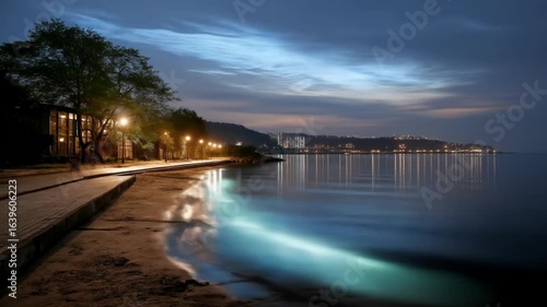 Wallpaper Mural Nighttime coastal scene with illuminated buildings and boardwalk Torontodigital.ca