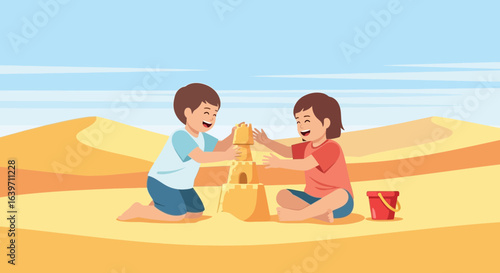 Children building a sandcastle at the beach with blue sky background