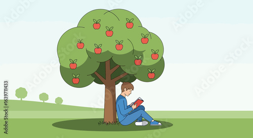 Boy engrossed in novel under a fruitful apple tree on a tranquil lawn