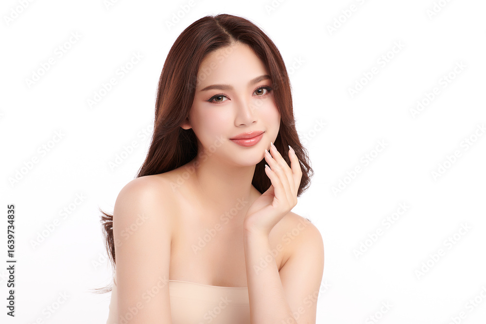 A beautiful young Asian woman with clean, fresh skin against a white background. Skincare, facial treatment, cosmetology, beauty, and spa. An elegant portrait of an Asian woman. A beautiful young Asian woman with clean, fresh skin against a white background. Skincare, facial treatment, cosmetology, beauty, and spa. An elegant portrait of an Asian woman.