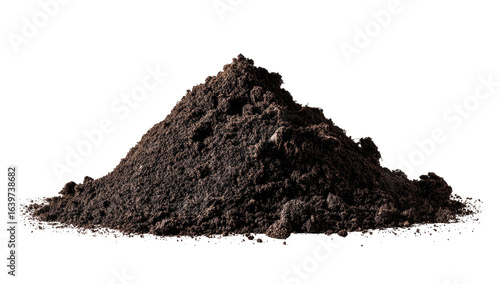 A conical pile of dark brown soil
