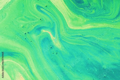 Marbled blue and green abstract background. Liquid marble ink pattern.