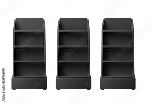 Three empty, dark gray retail display units, each with three shelves, stand side-by-side against a black background.  The shelves are slightly angled inward and the units have a simple, modern design