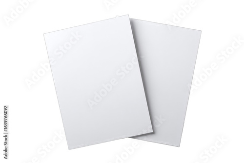 Two blank white sheets of paper overlapping