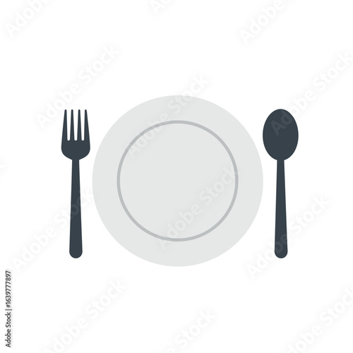 Fork and spoon placed neatly on a white plate on table isolated for dining setting