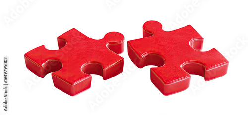 Two red puzzle pieces against a black background