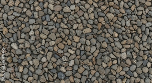 A tightly packed seamless texture of smooth rounded river rocks in shades of grey and brown