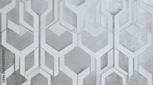 Modern geometric trellis design in grey and metallic silver wallpaper texture