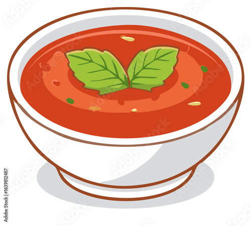 Delicious tomato soup garnished with fresh green basil leaves and sprinkled seeds in a white bowl