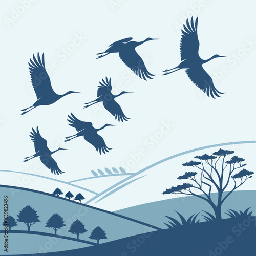 Flock of birds flying in a V formation across a clear sky, symbolizing migration and unity in nature