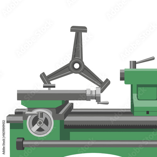 Close-up view of a green industrial lathe machine with a metal component attached.
