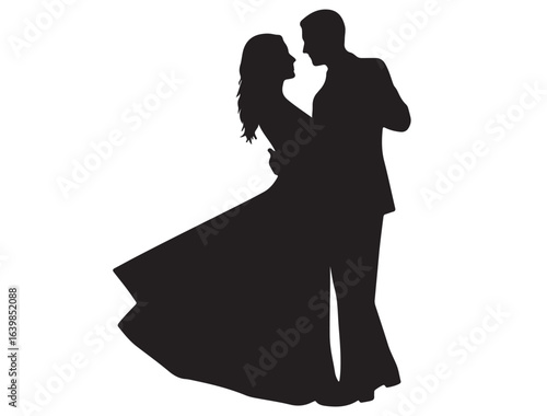 Silhouetted couple during their first dance