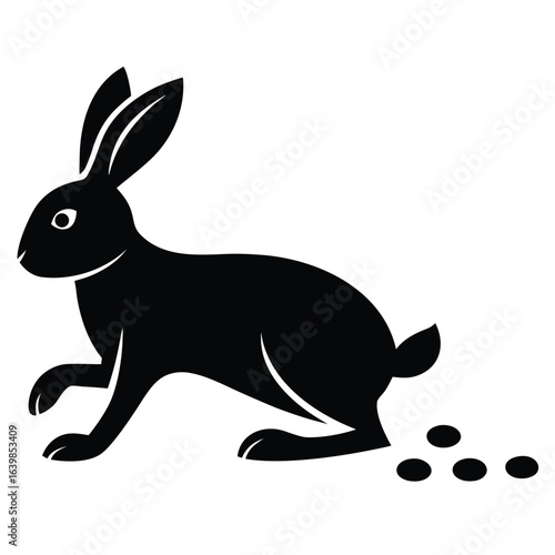 Black rabbit with droppings hare animal