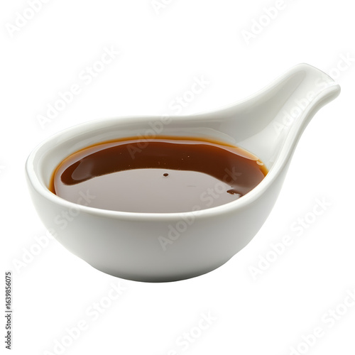 Brown sauce in a white porcelain dish isolated on transparent background cutout