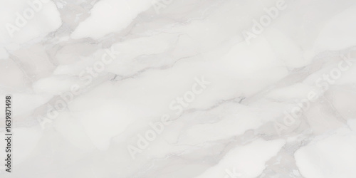 Luxury texture of light gray marble with flowing natural patterns and faint metallic highlights.	