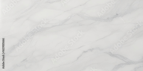 Luxury texture of light gray marble with flowing natural patterns and faint metallic highlights.	