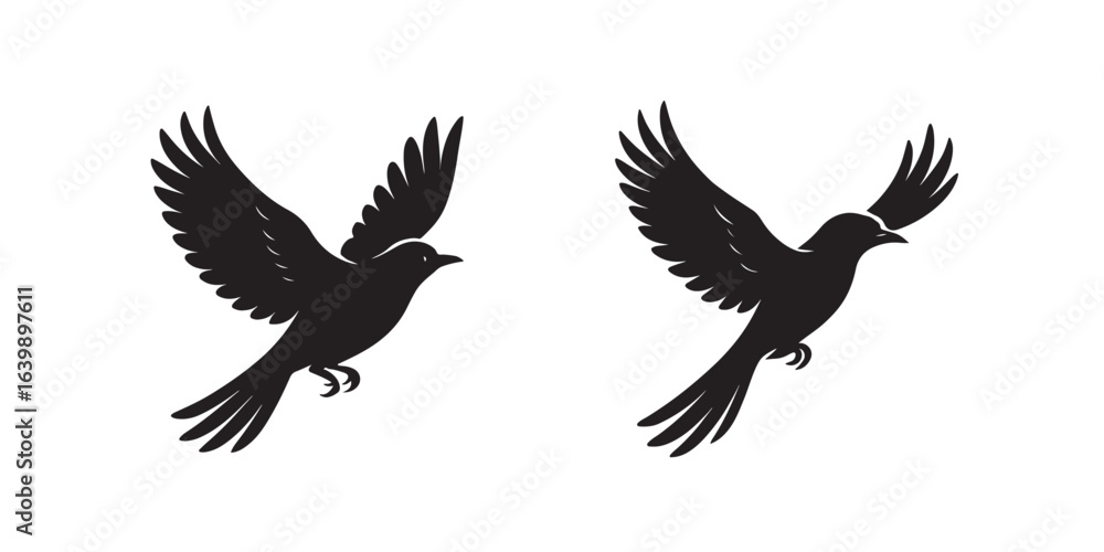 Two black silhouette birds in flight against a white background Two black silhouette birds in flight against a white background