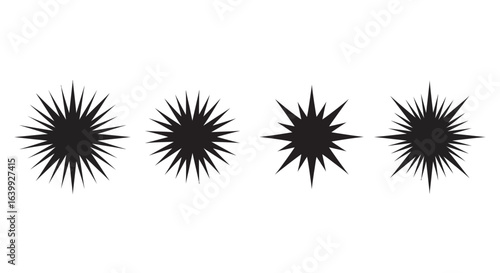Four spiky starburst shapes silhouette