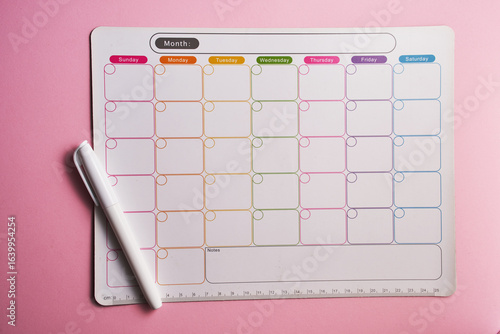 magnet monthly planner with marker pen.