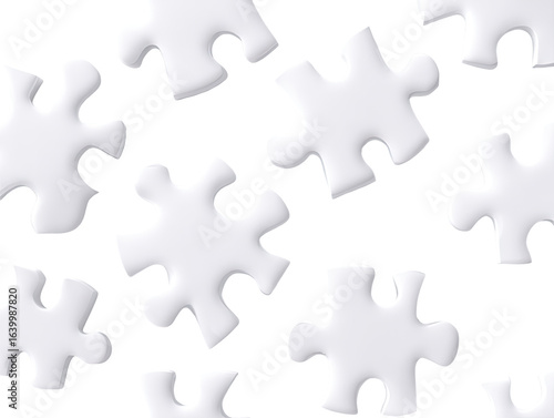 Scattered white puzzle pieces against black background
