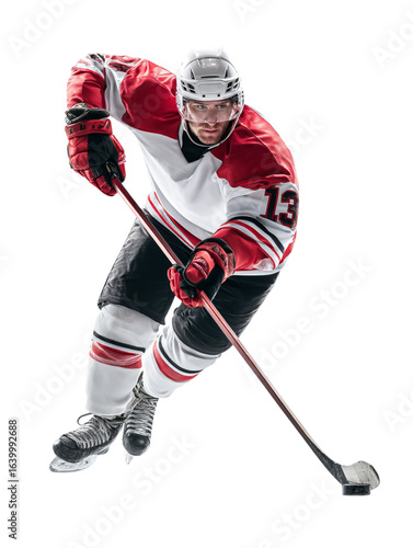 PNG of Action shot of a male Caucasian hockey player in motion, showcasing speed and intensity on the ice.