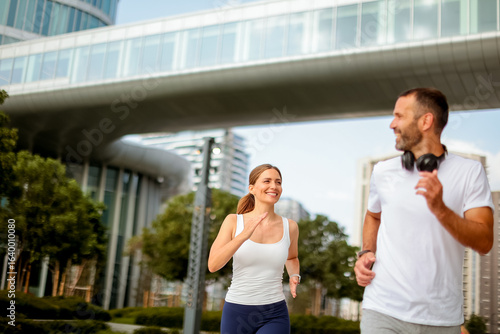 Joyful morning joggers enjo...