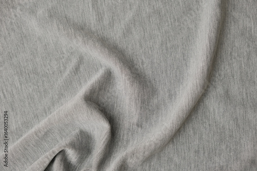 Photos Gray sportswear fabric texture background with soft drapery