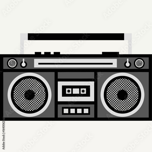 Retro boombox with speakers and cassette player.