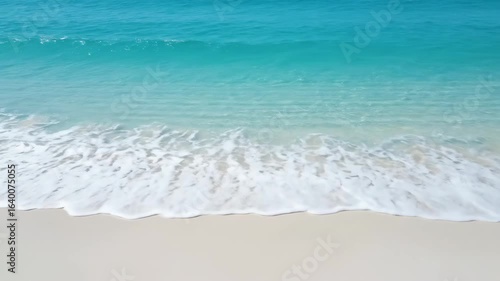 Wallpaper Mural Turquoise Ocean Waves on White Sandy Beach - Soft ocean waves gently lap onto a pristine white sandy beach. Torontodigital.ca