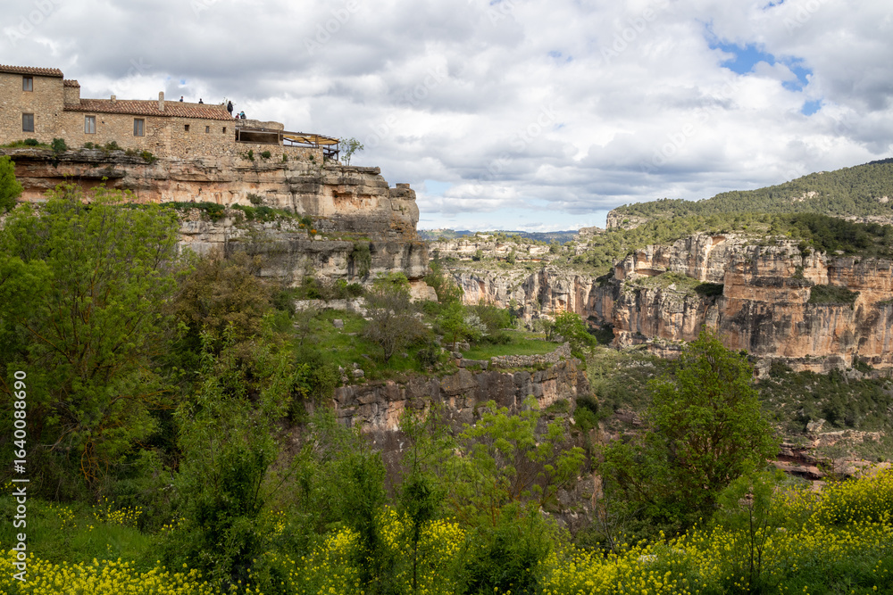 View from Siurana viewpoint over the reservoir, village, and Church of Santa Maria de Siurana in Tarragona, Catalonia, Spain. View from Siurana viewpoint over the reservoir, village, and Church of Santa Maria de Siurana in Tarragona, Catalonia, Spain.