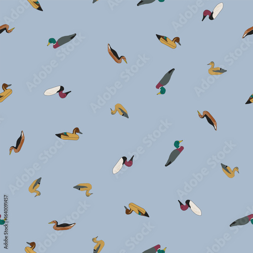 Ditsy Vintage Decoy Ducks Tossed on a Sky Blue Background creating a seamless pattern print